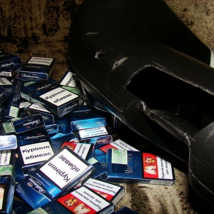 Țigări transportate cu snow-mobilul și ascunse într-un scaun auto pentru copii, descoperite de polițiștii de frontieră