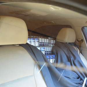 Descinderi la membrii unei rețele specializată în contrabanda cu țigări