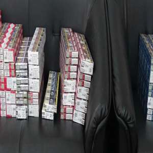 Peste 1.800 pachete cu țigări ascunse în două microbuze, descoperite la P.T.F. Giurgiu