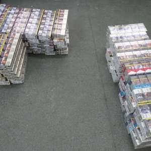 Peste 1.800 pachete cu țigări ascunse în două microbuze, descoperite la P.T.F. Giurgiu