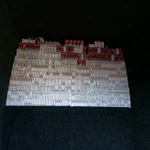 Aproximativ 15.000 de pachete cu ţigări, ascunse în pereţii dublii, portiere sau bordul unor autovehicule