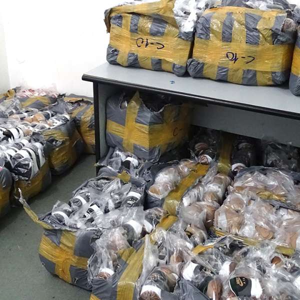 Bunuri în valoare de peste 130.000 lei, susceptibile a fi contrafăcute, confiscate la P.T.F. Giurgiu