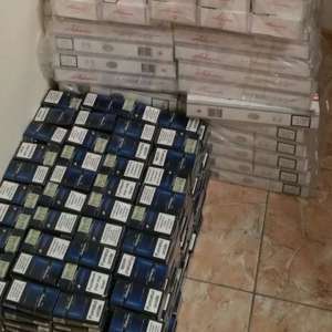 Peste 500.000 lei  îngropați în curtea unor contrabandiști de țigări