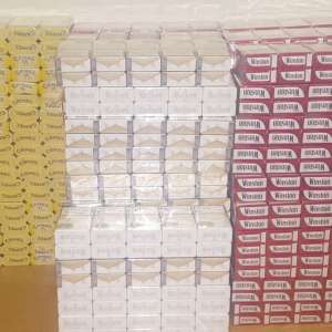 Țigări de contrabandă, ascunse în valize