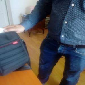 Document de identitate fals, ascuns în borsetă
