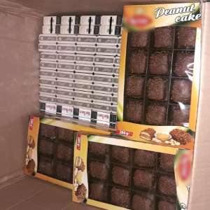 Ţigări și sticle cu alcool descoperite ascunse sub cutii cu prăjituri, la P.T.F. Calafat