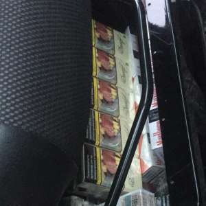 1090 pachete cu țigări, descoperite într-un  microbuz, la P.T.F. Giurgiu