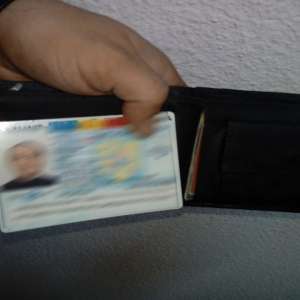Carte de identitate falsă, ascunsă în portmoneu