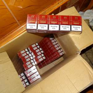 Pachete cu țigări disimulate în cutii cu dulciuri, la P.T.F. Giurgiu