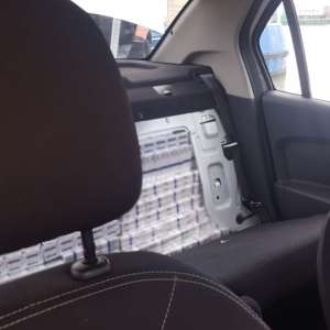 Aproximativ 20.000 de pachete cu țigări de contrabandă, descoperite de polițiștii de frontieră