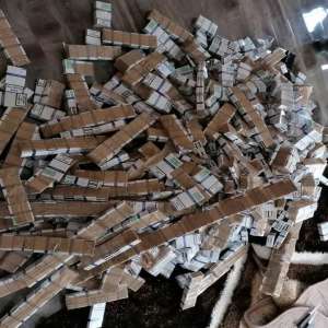 Percheziții finalizate cu confiscarea a mii de pachete cu țigări, armă cu aer comprimat, stații de emisie-recepție și diferite sume în lei și valută