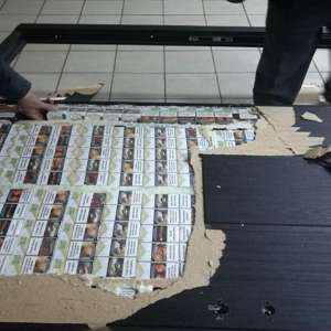 Ţigări de contrabandă, ascunse în uşi metalice