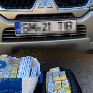 Doi cetățeni români cercetați pentru contrabandă cu țigări