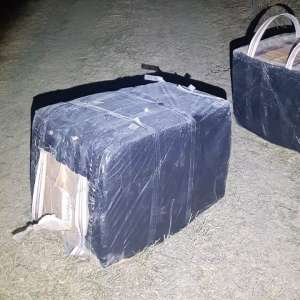 Mii de pachete cu ţigări de contrabandă descoperite de poliţiştii de frontieră