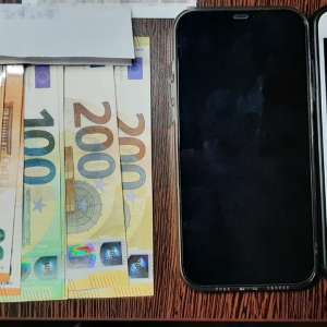 Percheziţii la o grupare infracțională specializată în trafic de migranți