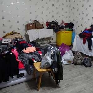 Articole vestimentare contrafăcute, descoperite în urma unei percheziții domiciliare efectuate în județul Olt