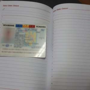 Carte de identitate falsă ascunsă într-o agendă
