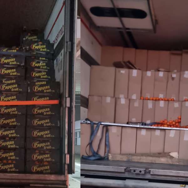 Țigări de contrabandă în valoare de peste 2 milioane de euro, descoperite într-un tir, în spatele unui „capac” din cutii de portocale