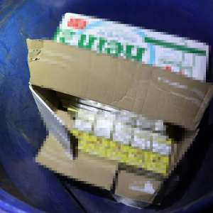 Peste 15.000 pachete țigări și sume în valută confiscate în urma unor percheziții în Moisei și Borșa