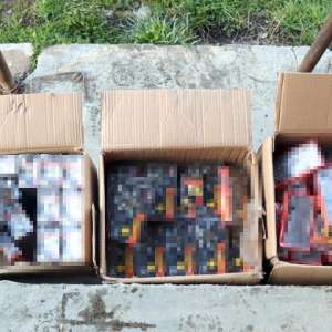 Peste 66.000 pachete țigări, 550.684 lei și sume în valută confiscate în urma a 14 percheziții în Maramureș