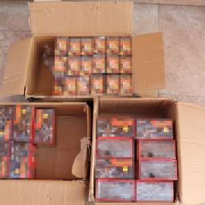 Peste 66.000 pachete țigări, 550.684 lei și sume în valută confiscate în urma a 14 percheziții în Maramureș