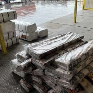 20.000 de metri de țesături textule contrafăcute, în valoare de 2.000.000 lei depistate în Portul Constanța