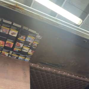 Peste 90.000 țigarete descoperite de polițiștii de frontieră români și bulgari în plafonul unui microbuz, în PTF Giurgiu-Ruse