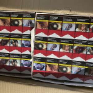 Sute de mii de ţigarete ascunse prin metoda \