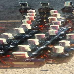 Surprize la controlul polițiștilor de frontieră: portbagaj plin cu coniac fără documente